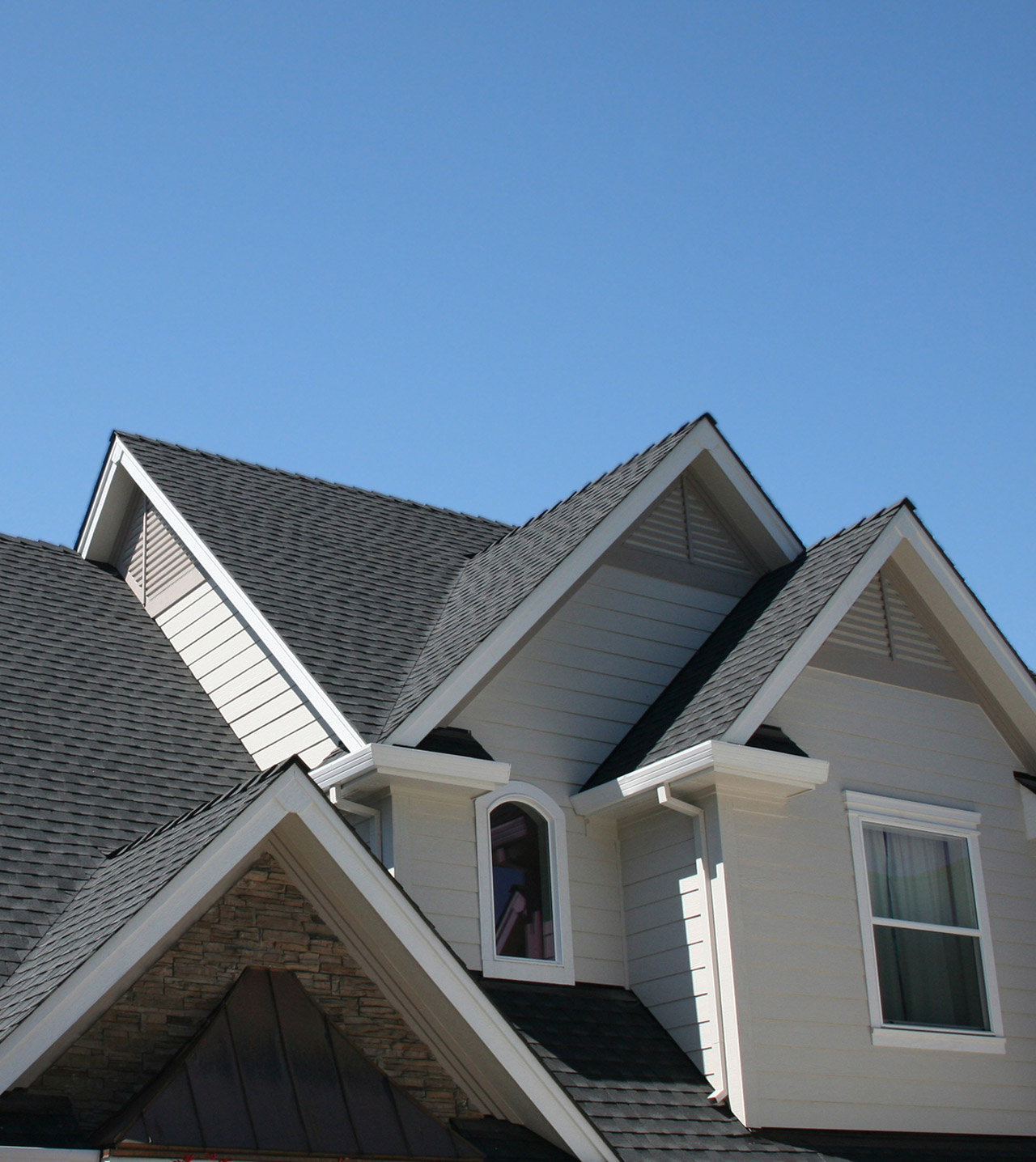 shingle-roof-with-several-gables